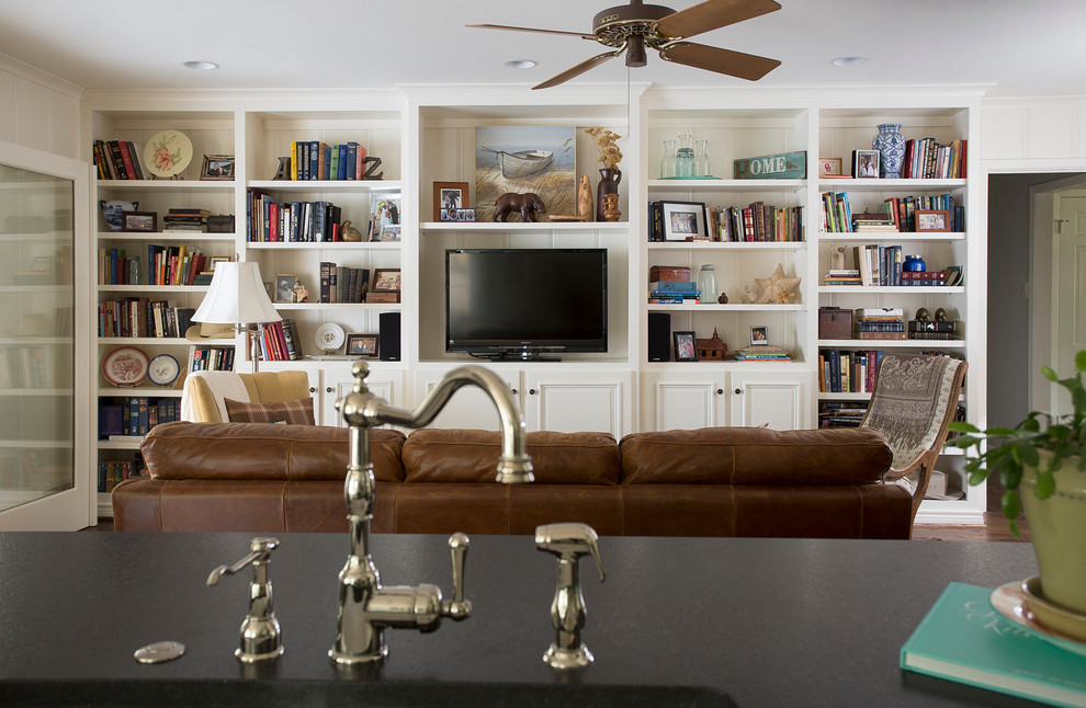 Photo of a traditional living room in Dallas with a built-in media wall.
