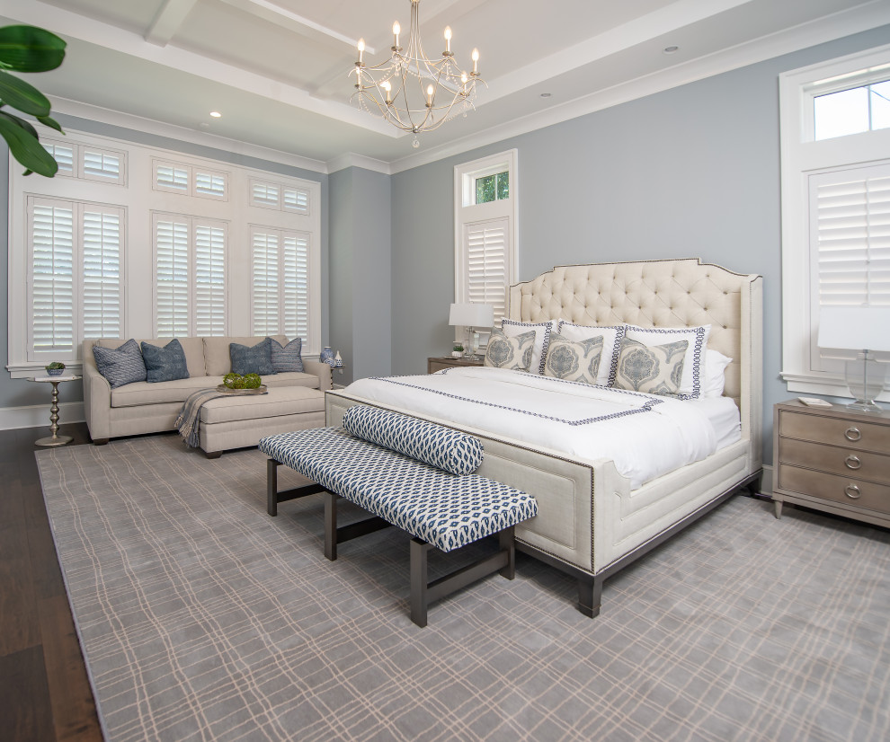 Design ideas for a transitional bedroom in Orlando with grey walls, dark hardwood floors and brown floor.