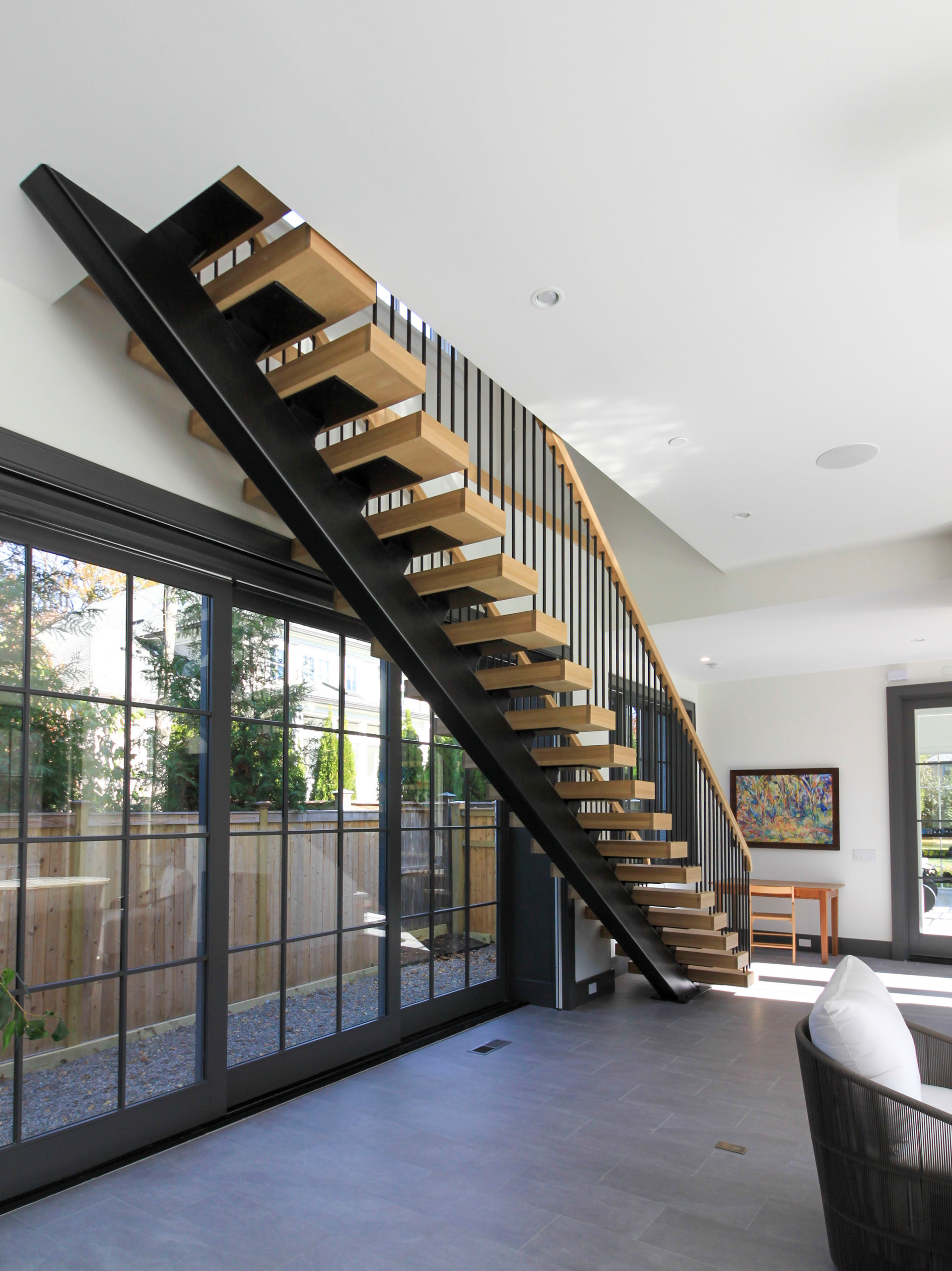 96_Dramatic cantilevered no-riser staircase, Bethesda, MD 20814