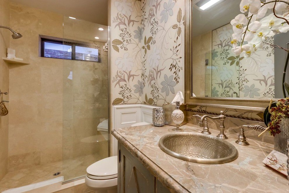 Small traditional 3/4 bathroom in Orange County with dark wood cabinets, a curbless shower, a two-piece toilet, beige tile, ceramic tile, beige walls, a drop-in sink, concrete benchtops, a hinged shower door and brown benchtops.