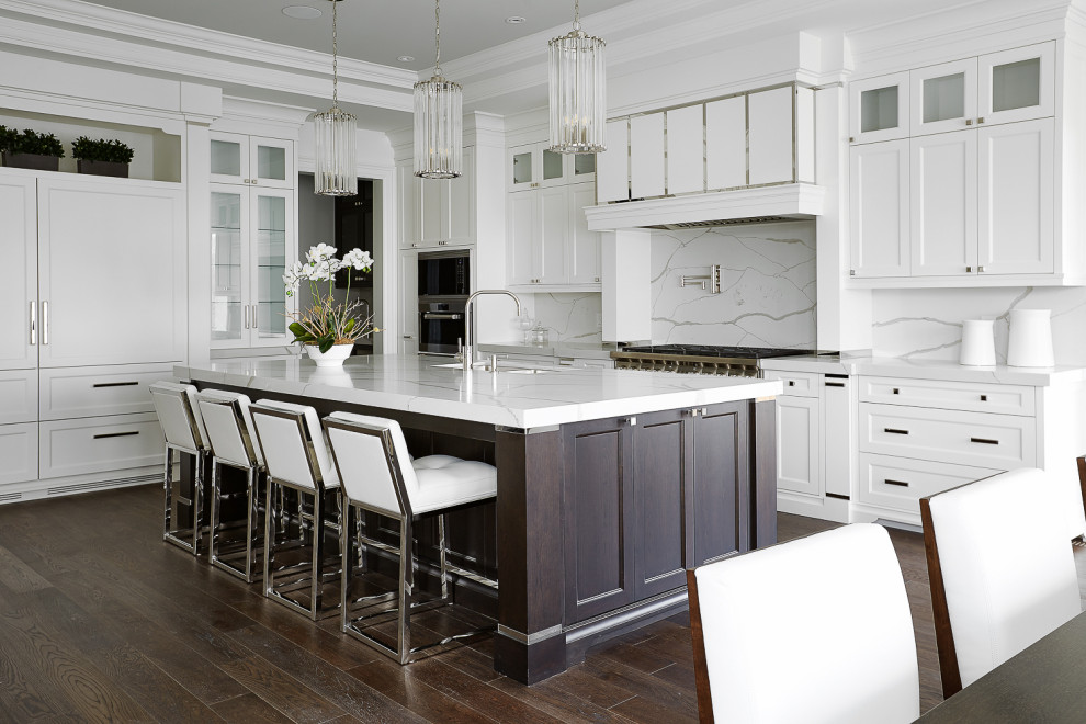 Eat-in kitchen - large transitional dark wood floor and tray ceiling eat-in kitchen idea in Toronto with an undermount sink, recessed-panel cabinets, white cabinets, quartzite countertops, multicolored backsplash, stainless steel appliances, an island and multicolored countertops