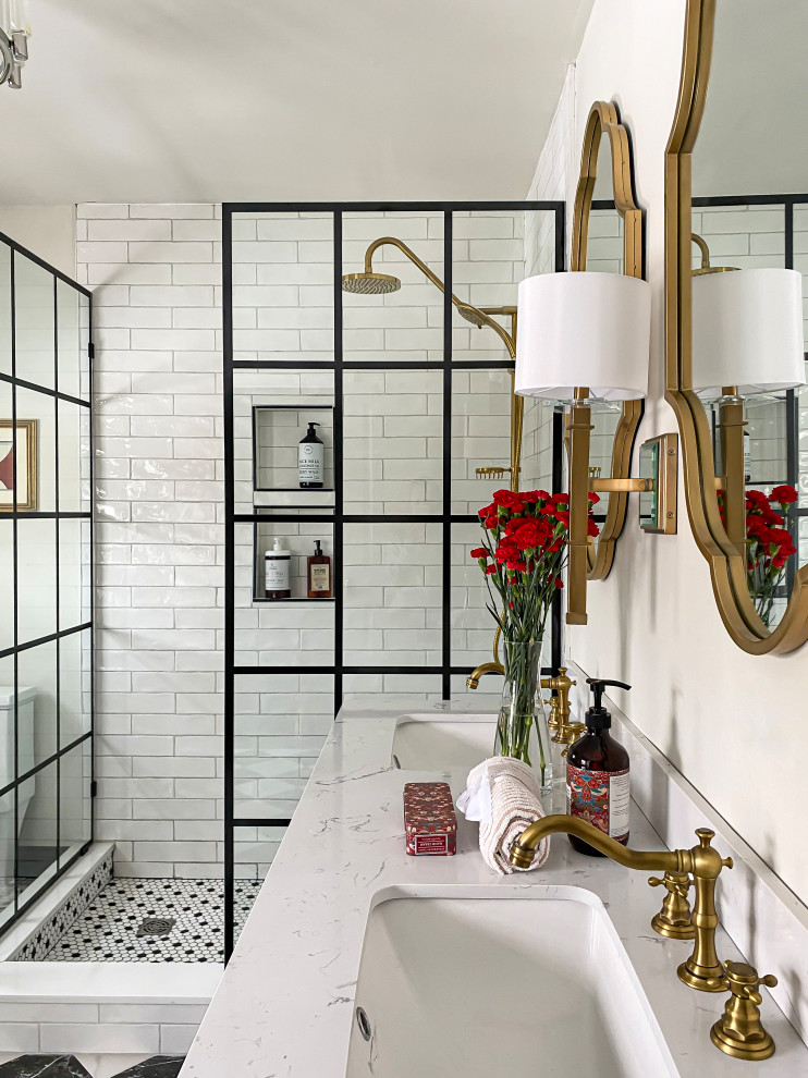 Mid-sized traditional master bathroom in Chicago with grey cabinets, an open shower, a one-piece toilet, white tile, subway tile, white walls, ceramic floors, quartzite benchtops, an open shower, white benchtops and a double vanity.