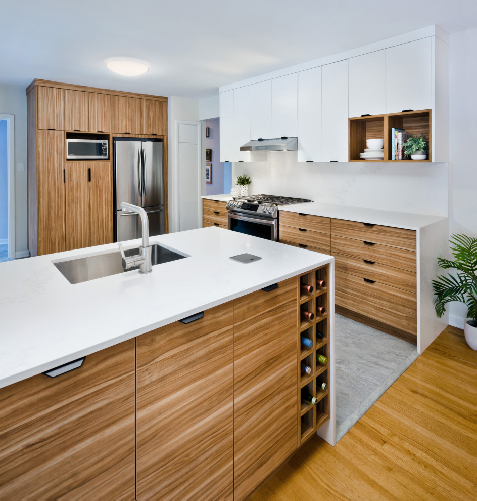 Photo of a small modern u-shaped eat-in kitchen in Calgary with a single-bowl sink, flat-panel cabinets, brown cabinets, quartzite benchtops, white splashback, stone slab splashback, stainless steel appliances, vinyl floors, a peninsula, grey floor and white benchtop.