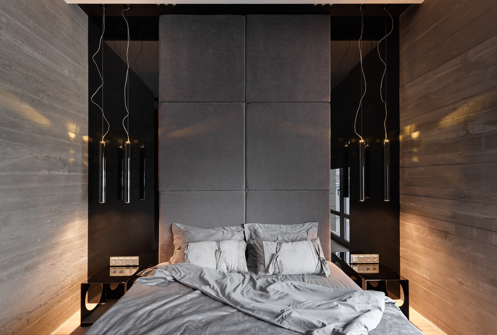 Imagen de dormitorio actual de tamaño medio con paredes grises