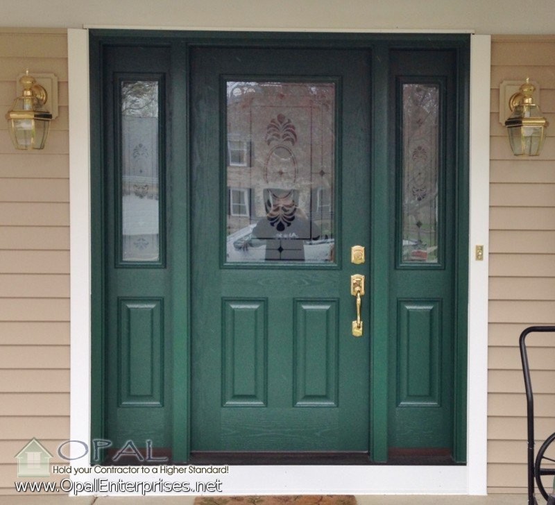 This is an example of a mid-sized traditional front door in Chicago with beige walls, concrete floors and a single front door.