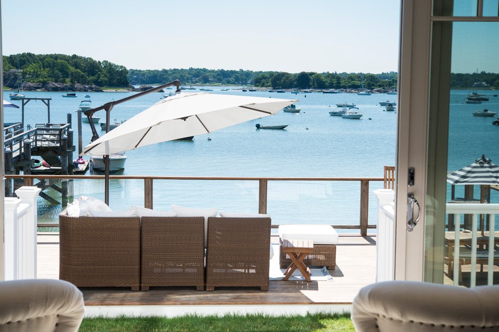 Deck - mid-sized transitional backyard deck idea in Boston