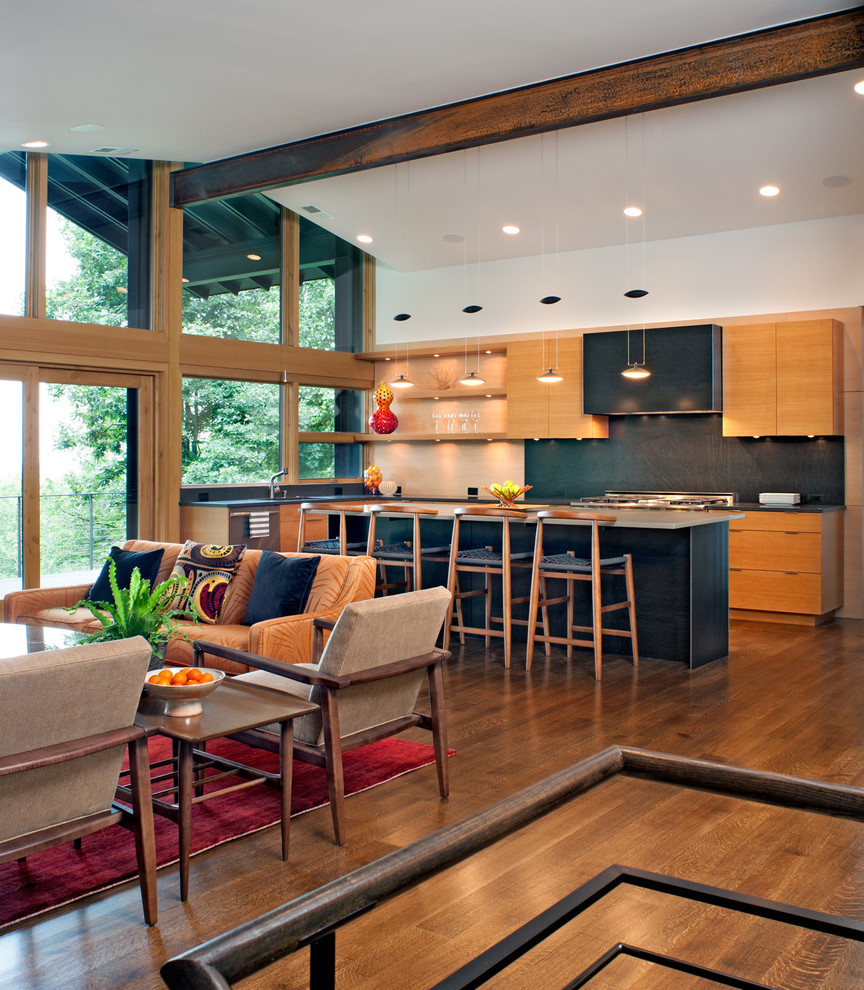 Inspiration for a contemporary l-shaped dark wood floor and brown floor eat-in kitchen remodel in Charlotte with flat-panel cabinets, medium tone wood cabinets, black backsplash, stainless steel appliances, an island and solid surface countertops