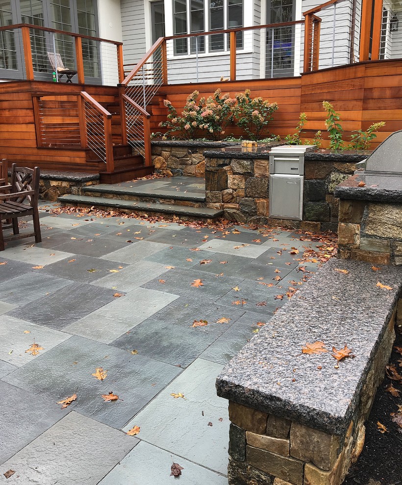 Example of a transitional home design design in Boston