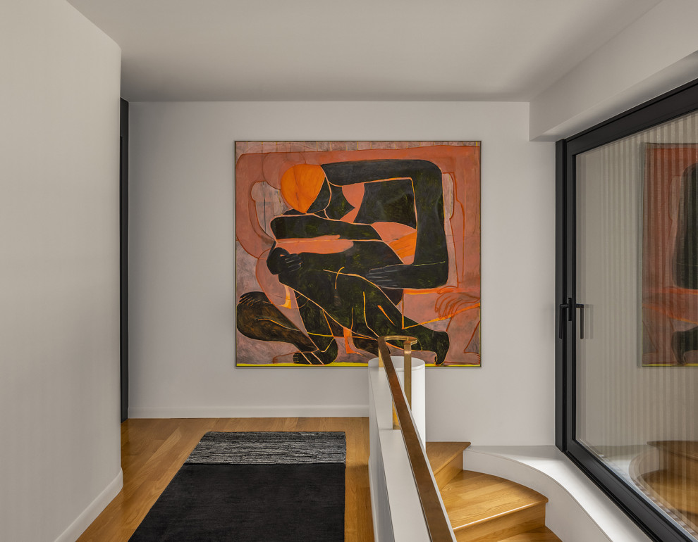 Staircase - contemporary wooden straight metal railing staircase idea in Seattle with wooden risers