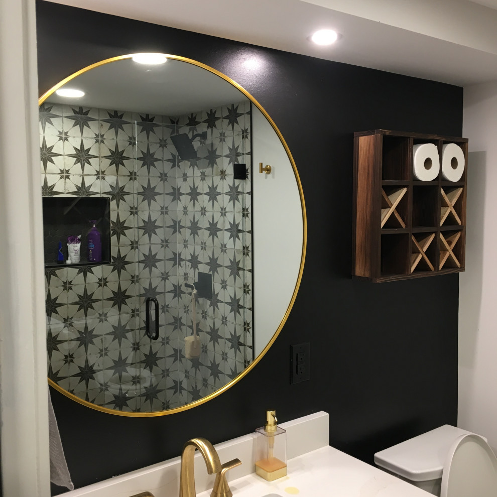 Mid-sized modern 3/4 wet room bathroom in Detroit with mosaic tile, black walls, laminate floors, brown floor, a hinged shower door, white benchtops and a single vanity.