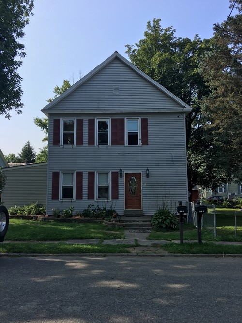 Ugly old house siding needs  replacement 