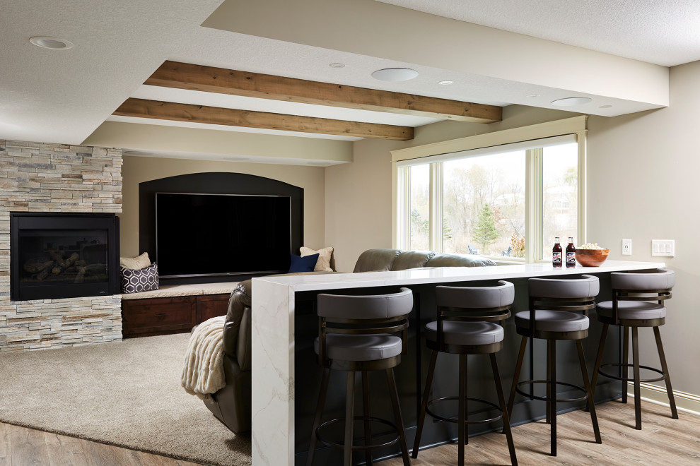 Photo of a large transitional home theatre in Minneapolis with grey walls, vinyl floors and brown floor.