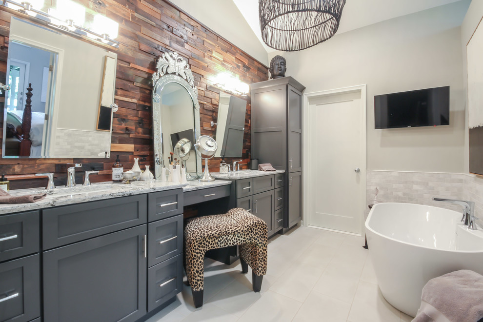 Large traditional master bathroom in Detroit with shaker cabinets, grey cabinets, a freestanding tub, white tile, marble, grey walls, porcelain floors, an undermount sink, engineered quartz benchtops, white floor and white benchtops.