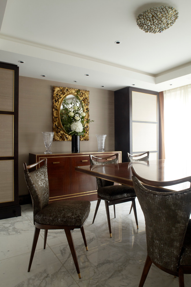 Inspiration for a contemporary separate dining room in London with beige walls and no fireplace.