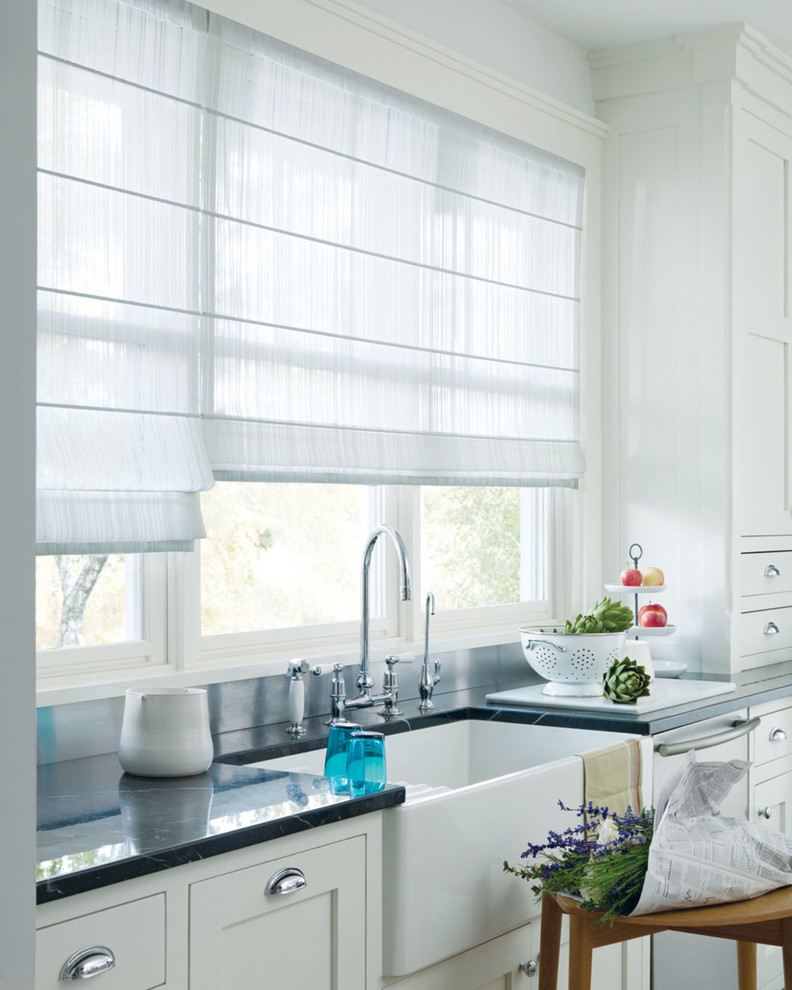 Mid-sized transitional kitchen photo with a farmhouse sink, shaker cabinets, white cabinets and marble countertops