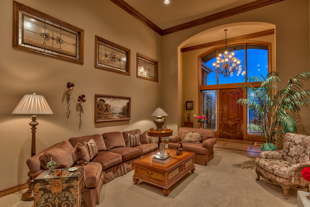 Large traditional formal enclosed living room in Omaha with brown walls, carpet, a standard fireplace, a stone fireplace surround, no tv and beige floor.