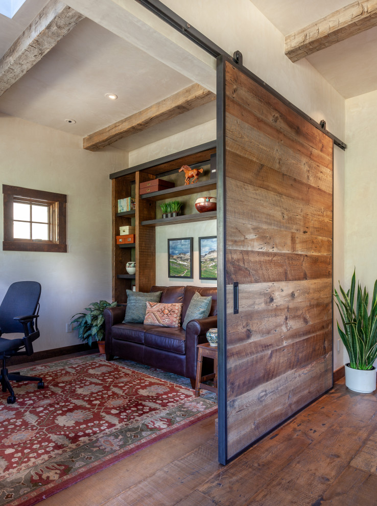 Inspiration for a rustic home design remodel in Denver