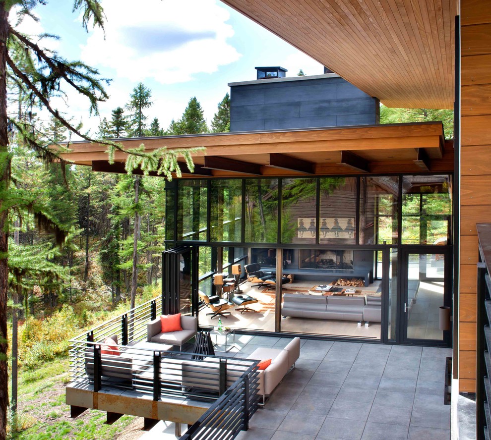 Inspiration for a large rustic deck remodel with no cover