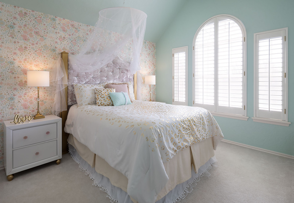 This is an example of a classic teen’s room for girls in Oklahoma City with green walls, carpet, beige floors, a vaulted ceiling and wallpapered walls.