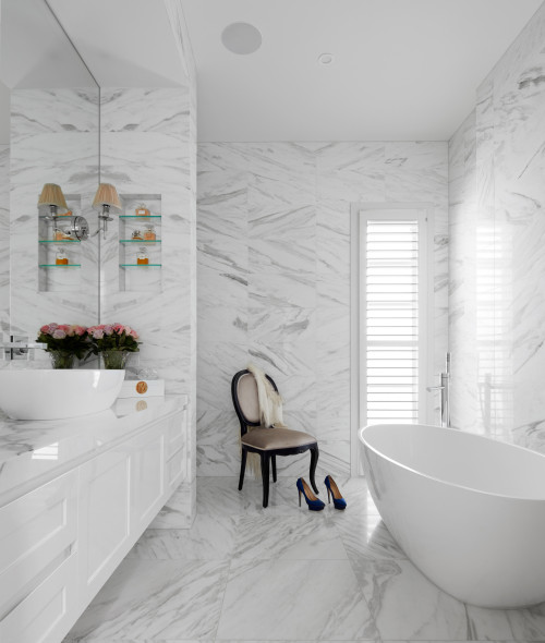 Elegance of Marble Tiles Paired With a White Vanity