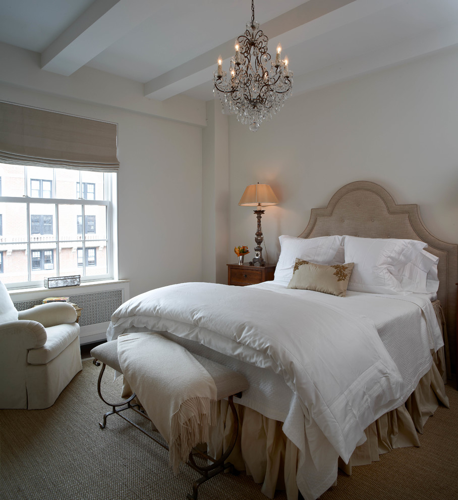 Design ideas for a transitional master bedroom in New York with white walls and no fireplace.