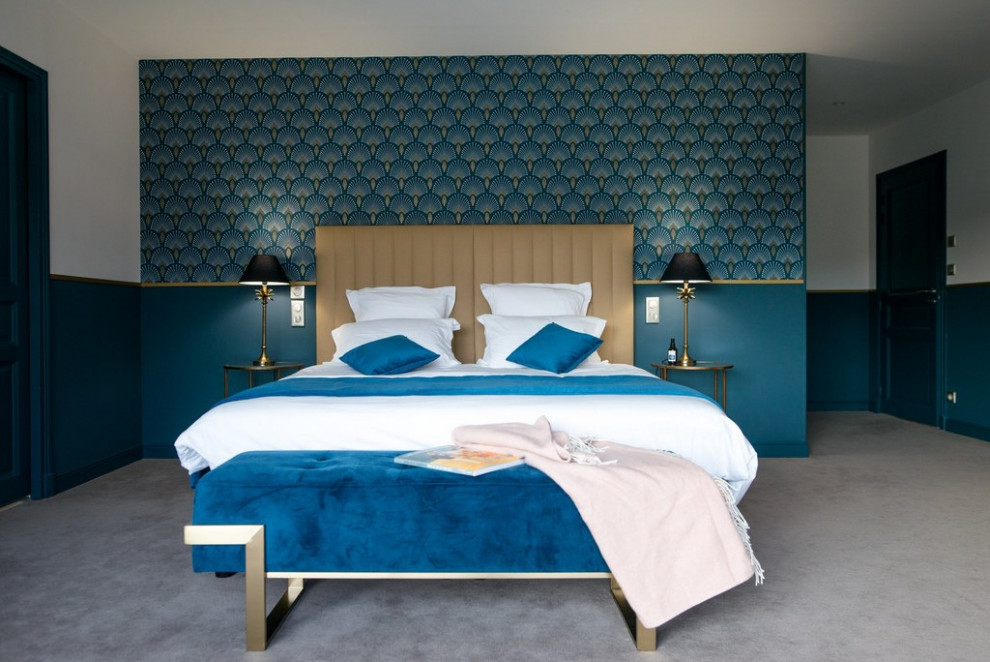 Photo of a contemporary bedroom in Paris with blue walls, light hardwood flooring and wallpapered walls.