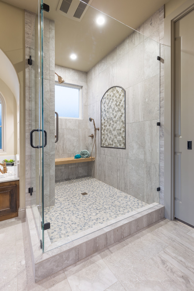 Design ideas for a large transitional bathroom in Austin with medium wood cabinets, a drop-in tub, white tile, porcelain tile, beige walls, pebble tile floors, an undermount sink, engineered quartz benchtops, recessed-panel cabinets and with a sauna.