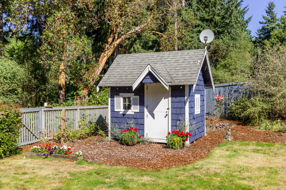 Photo of a small traditional detached garden shed in Seattle.