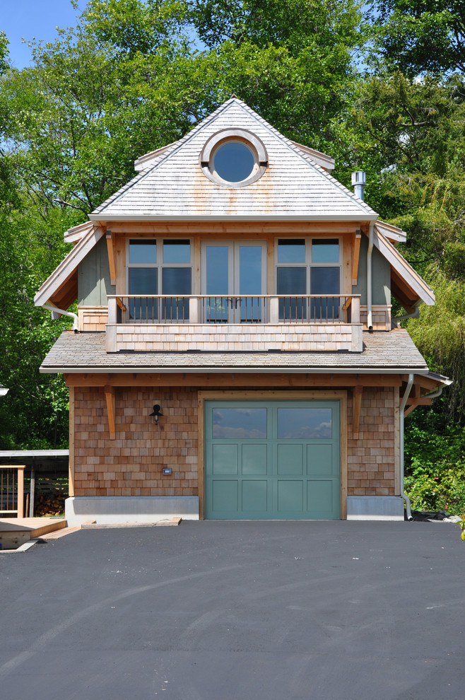 This is an example of a beach style detached garage in Seattle.