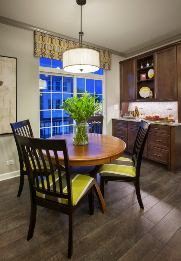 Example of a transitional kitchen design in Chicago with marble countertops and stainless steel appliances