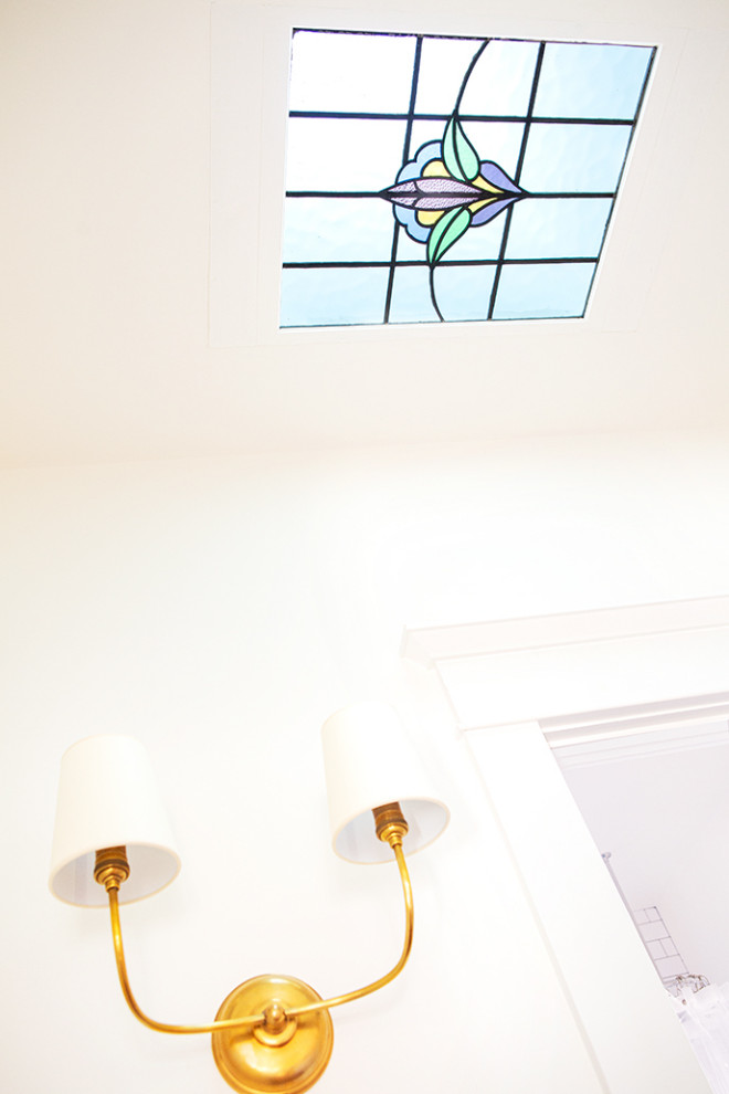 Inspiration for a small craftsman hallway remodel in Los Angeles with white walls