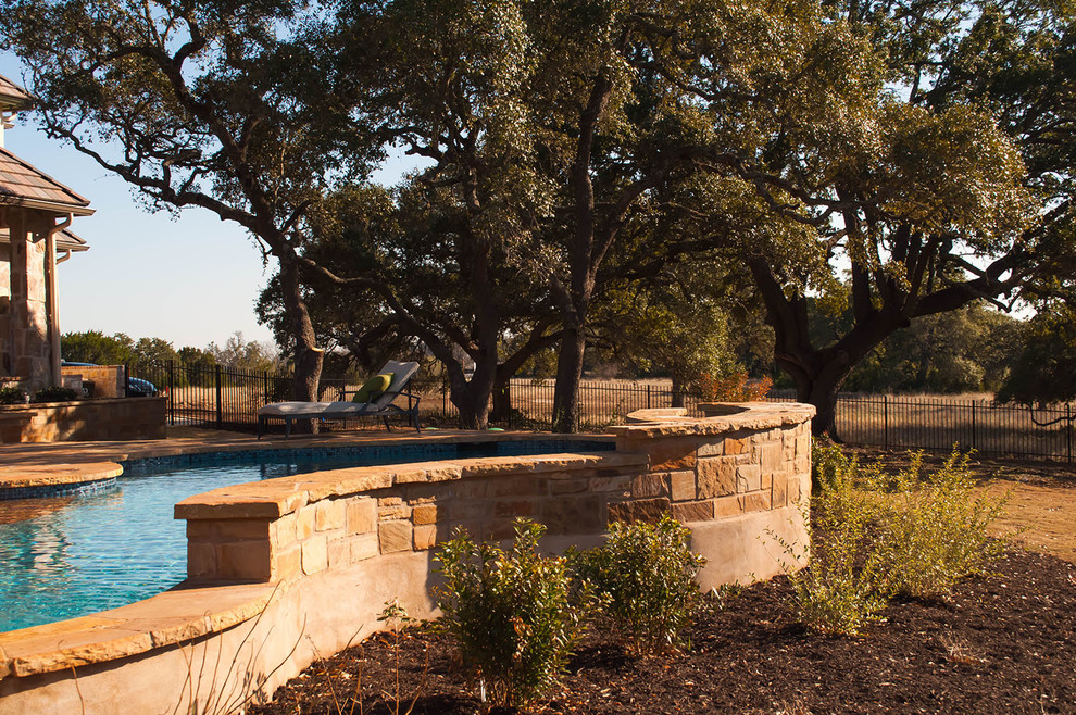 Mountain style home design photo in Austin