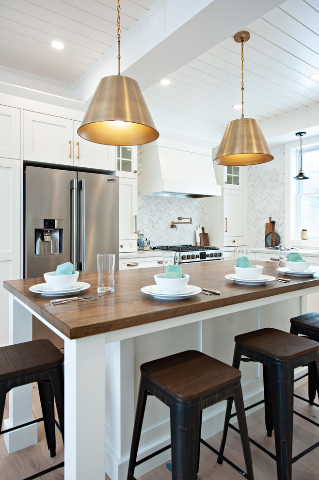 Example of a transitional kitchen design in Toronto