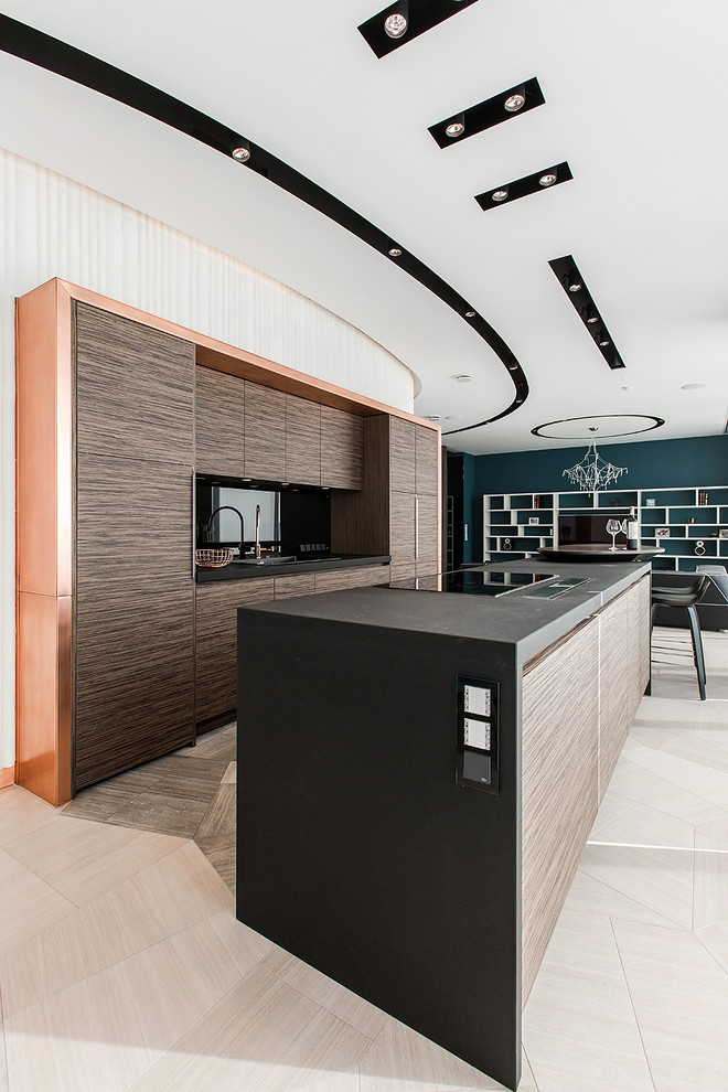 Photo of a contemporary galley open plan kitchen in Moscow with flat-panel cabinets, dark wood cabinets and with island.