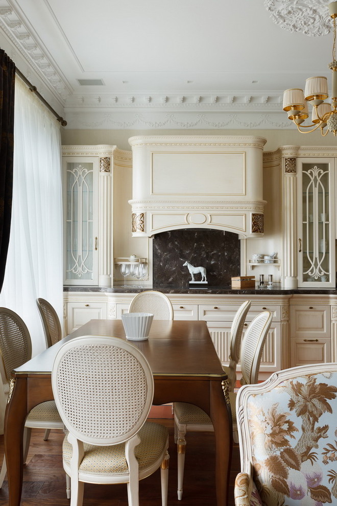 Design ideas for a traditional dining room in Saint Petersburg.