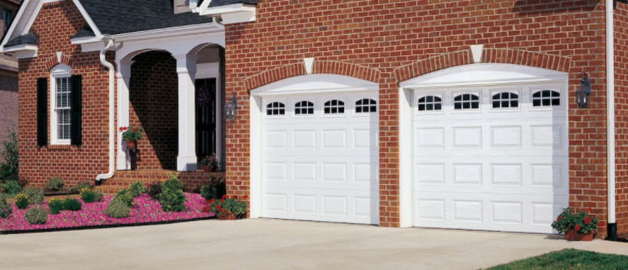 This is an example of a mid-sized traditional attached two-car garage in DC Metro.