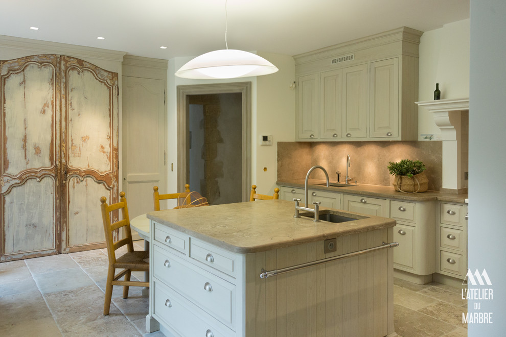 Mediterranean single-wall separate kitchen in Bordeaux with with island.