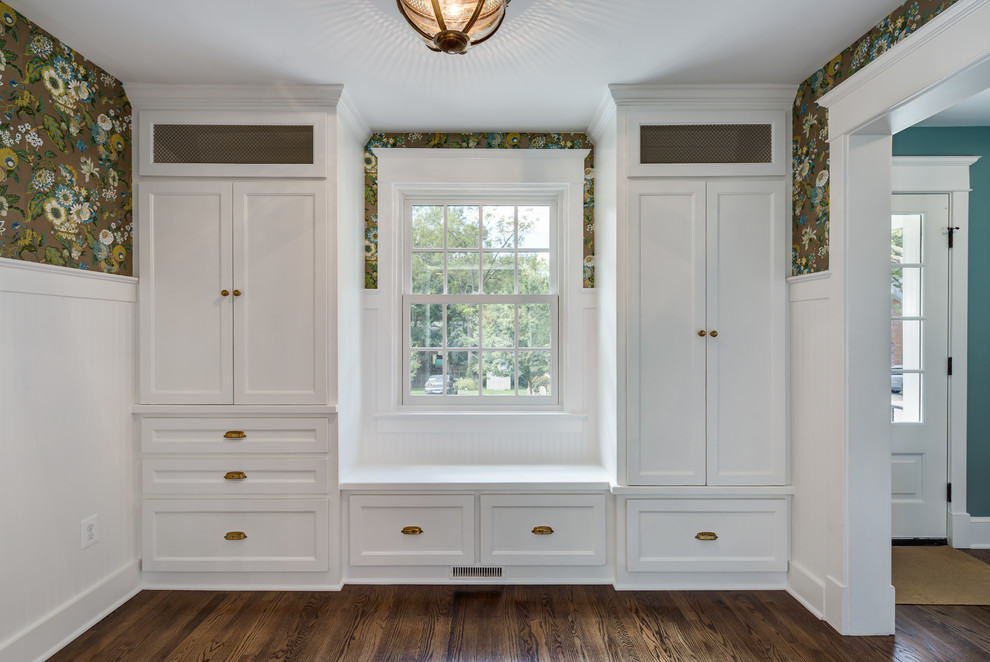 Photo of a mid-sized transitional mudroom in DC Metro with brown walls, medium hardwood floors, a single front door, a white front door and brown floor.