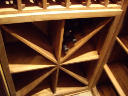 Photo of a small traditional wine cellar in Dallas with storage racks.