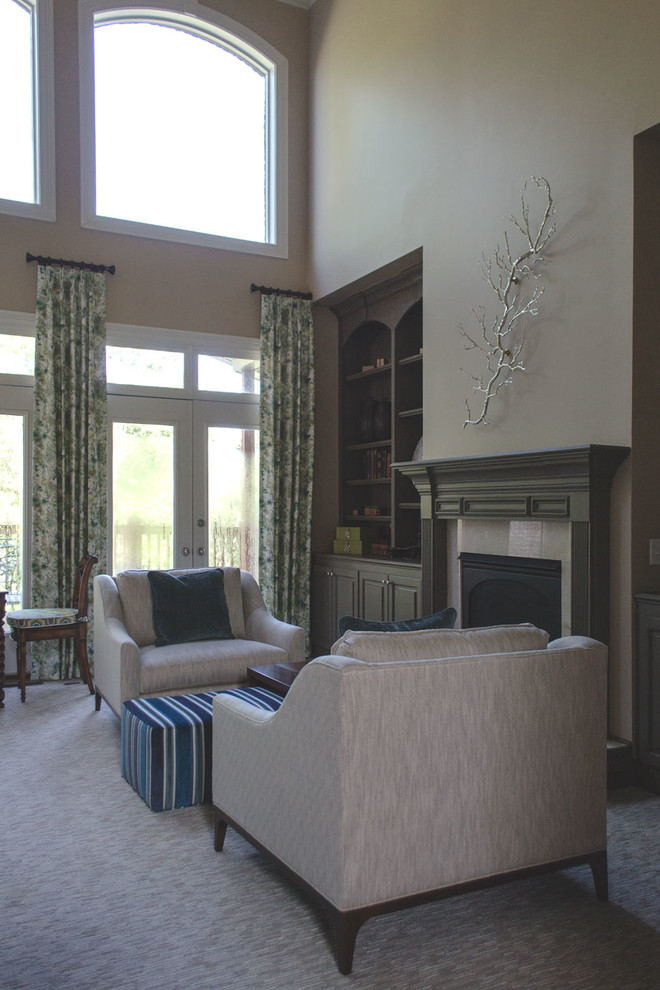 Photo of a large transitional open concept living room in Louisville with carpet, a standard fireplace, no tv, a music area, beige walls, a wood fireplace surround and beige floor.