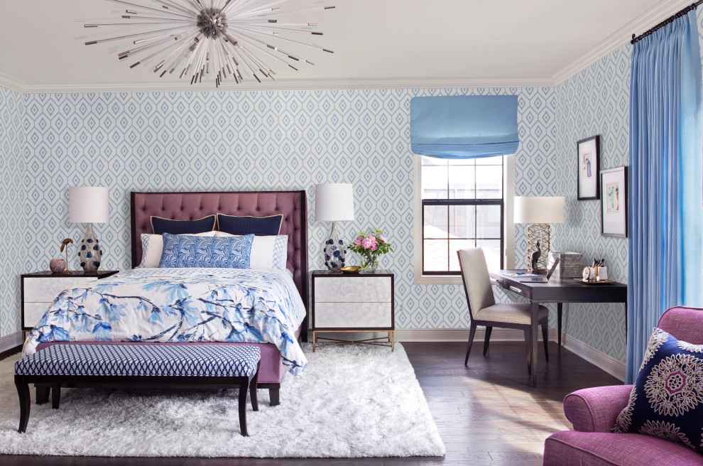 This is an example of an expansive transitional guest bedroom with blue walls, brown floor, wallpaper and dark hardwood floors.