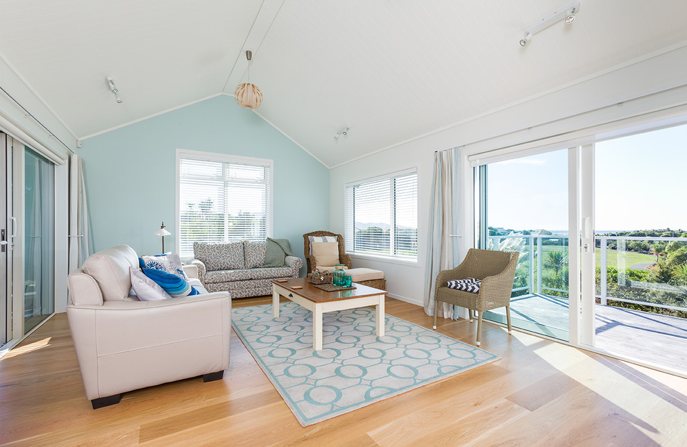 Photo of a beach style family room in Wellington.