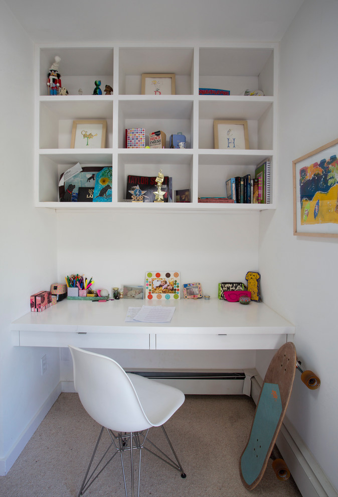 This is an example of a small contemporary kids' room in Albuquerque with white walls.