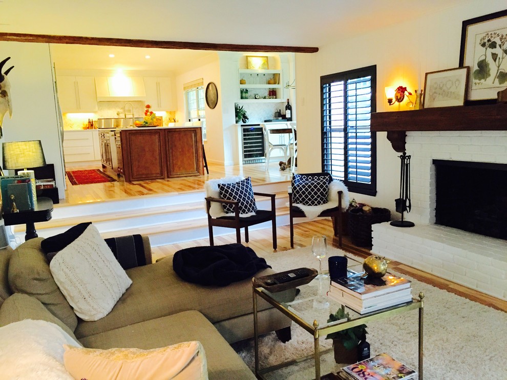 Example of a transitional home design design in Denver