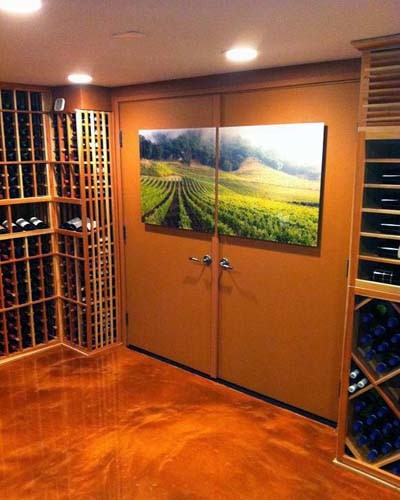Design ideas for a mid-sized traditional wine cellar in Orange County with storage racks.