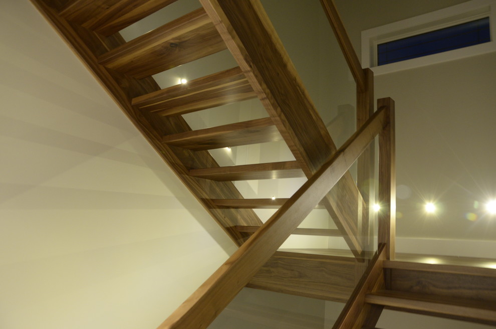 Inspiration for a mid-sized modern wooden l-shaped open and glass railing staircase remodel