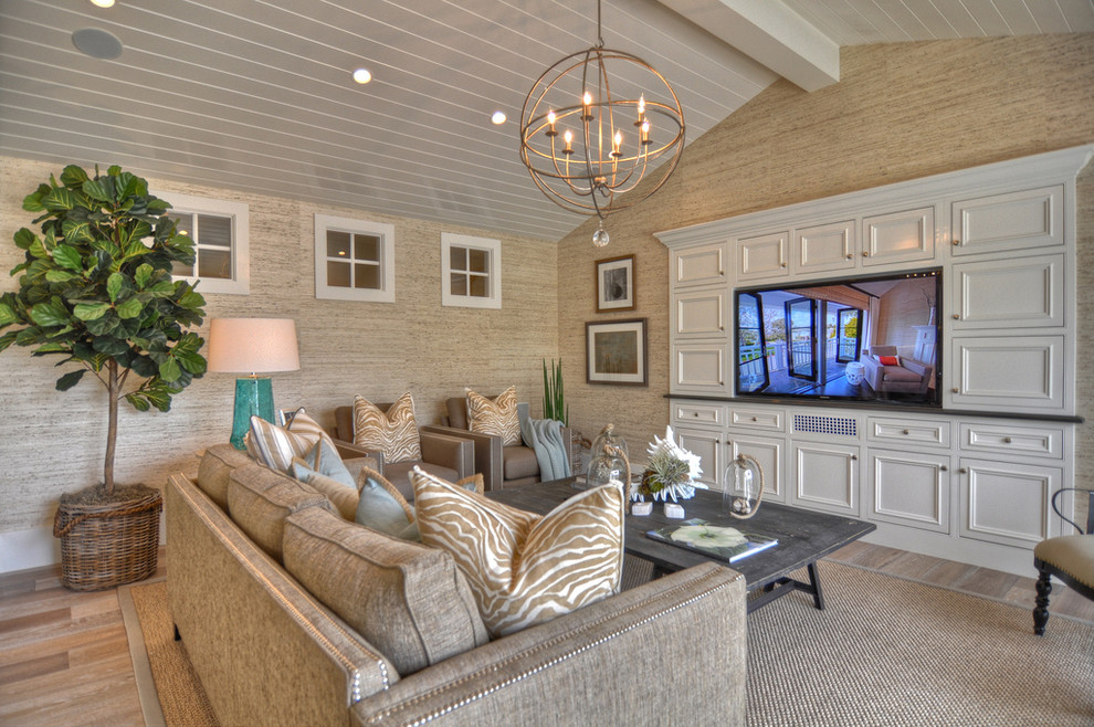 Design ideas for a large beach style living room in Los Angeles with beige walls and a built-in media wall.