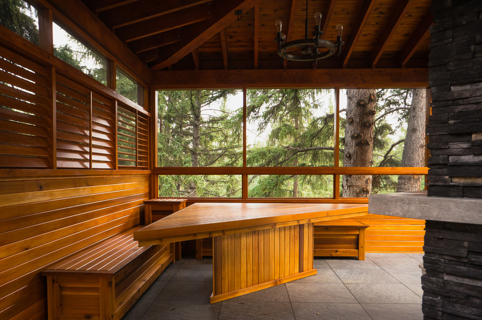 Mountain style deck photo in Calgary