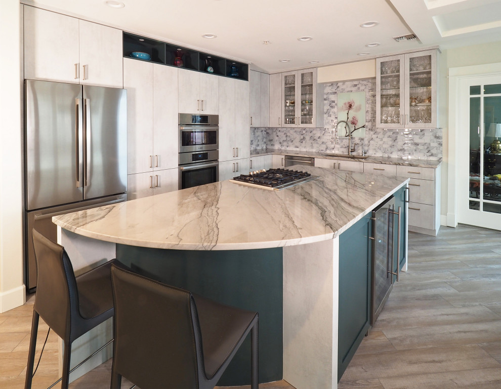 This is an example of a mid-sized contemporary l-shaped open plan kitchen in Other with a single-bowl sink, flat-panel cabinets, grey cabinets, quartzite benchtops, grey splashback, glass tile splashback, stainless steel appliances, vinyl floors, with island, grey floor, green benchtop and coffered.