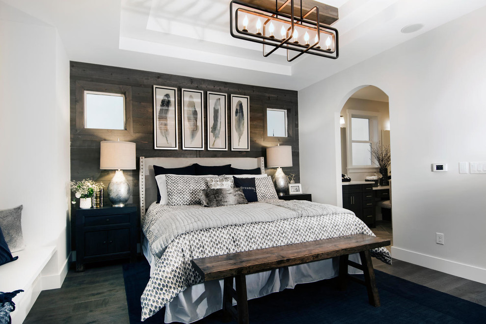 Inspiration for a transitional bedroom in Denver with white walls, dark hardwood floors and no fireplace.